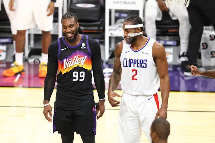 Jan 3, 2021; Phoenix, Arizona, USA; Phoenix Suns forward Jae Crowder (99) and Los Angeles Clippers forward Kawhi Leonard (2) talk in the second half at Phoenix Suns Arena. Mandatory Credit: Billy Hardiman-USA TODAY Sports